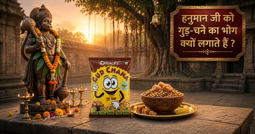 A devotional scene featuring Lord Hanuman, an Orgalife Gud Chana packet, and a bowl of jaggery with roasted gram prasad, symbolizing the traditional Tuesday offering for blessings, strength, and positive energy.